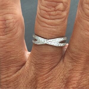 NWT simple silver x design paved shining zirconia ring with box. Size 7